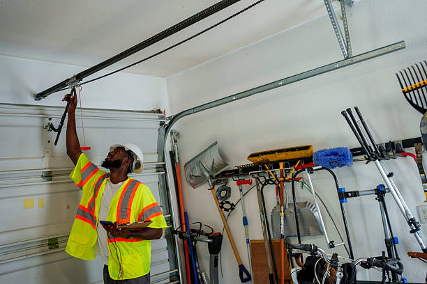 Professional Garage Door Panel Replacement technician working in Oyster Bay Cove, NY